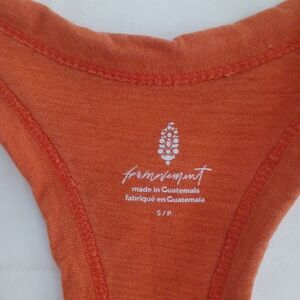 A bundle of 3 tops both size small both are orange 2 is FP and other is Zara